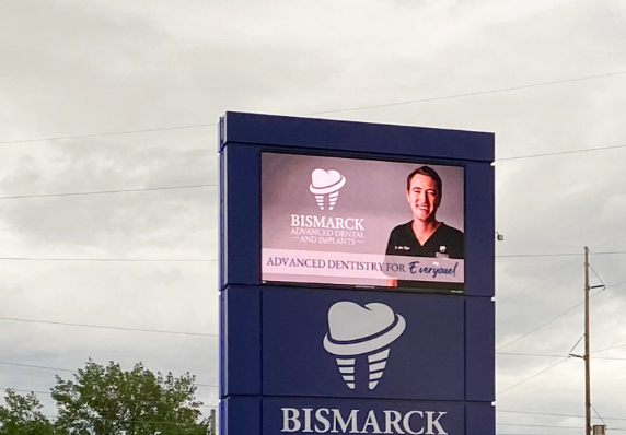 Bismarck community entrance monument sign with illuminated lettering