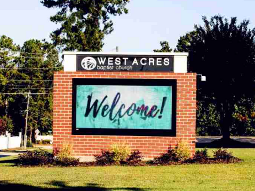 West Acres Baptist Church monument sign with brick base religious signage